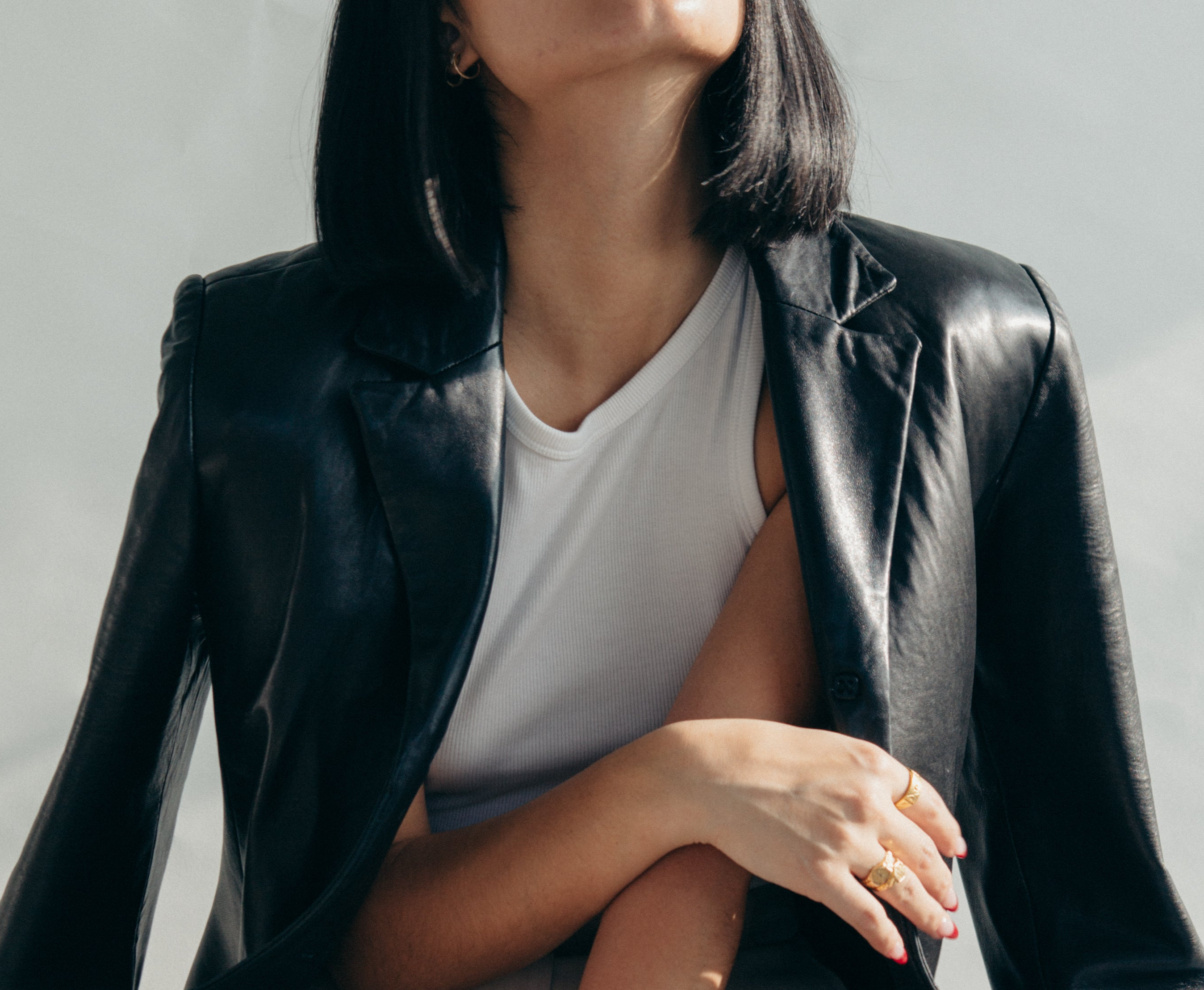 close-up-leather-jacket-over-shoulders_22b5f47d-0b76-4f07-83b8-91425bd5be93.png